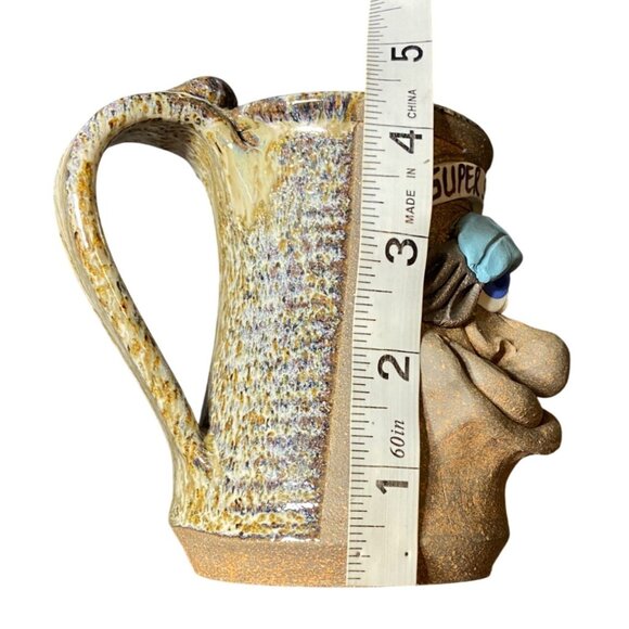 Handmade Ceramic Mug With Comical Super Skier Design & Blue Hat - Picture 6 of 7